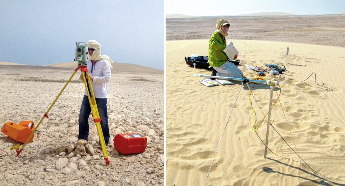 Ricercatori che sondano le dune di sabbia