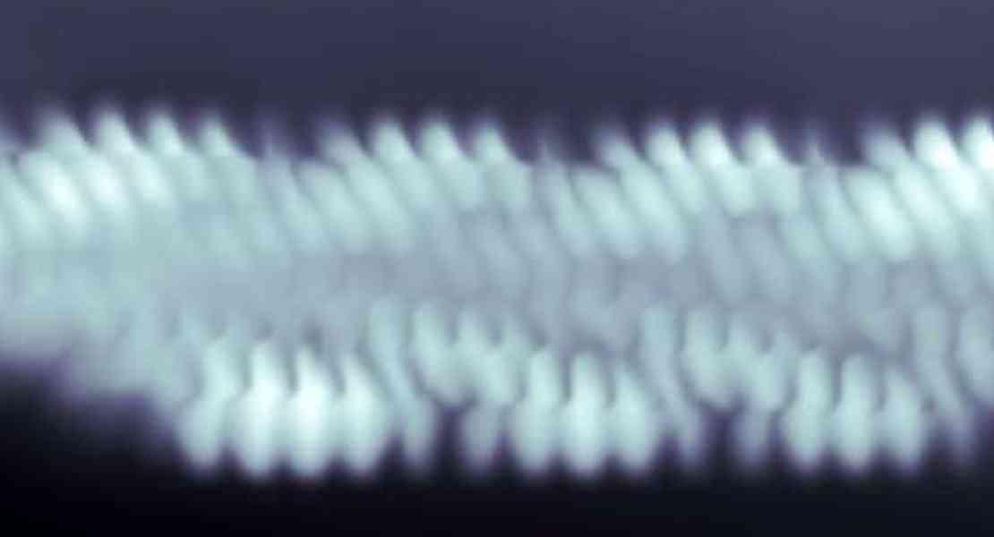 Scansione dell'immagine della microscopia del tunneling di un zigzag graphene nanoribbon